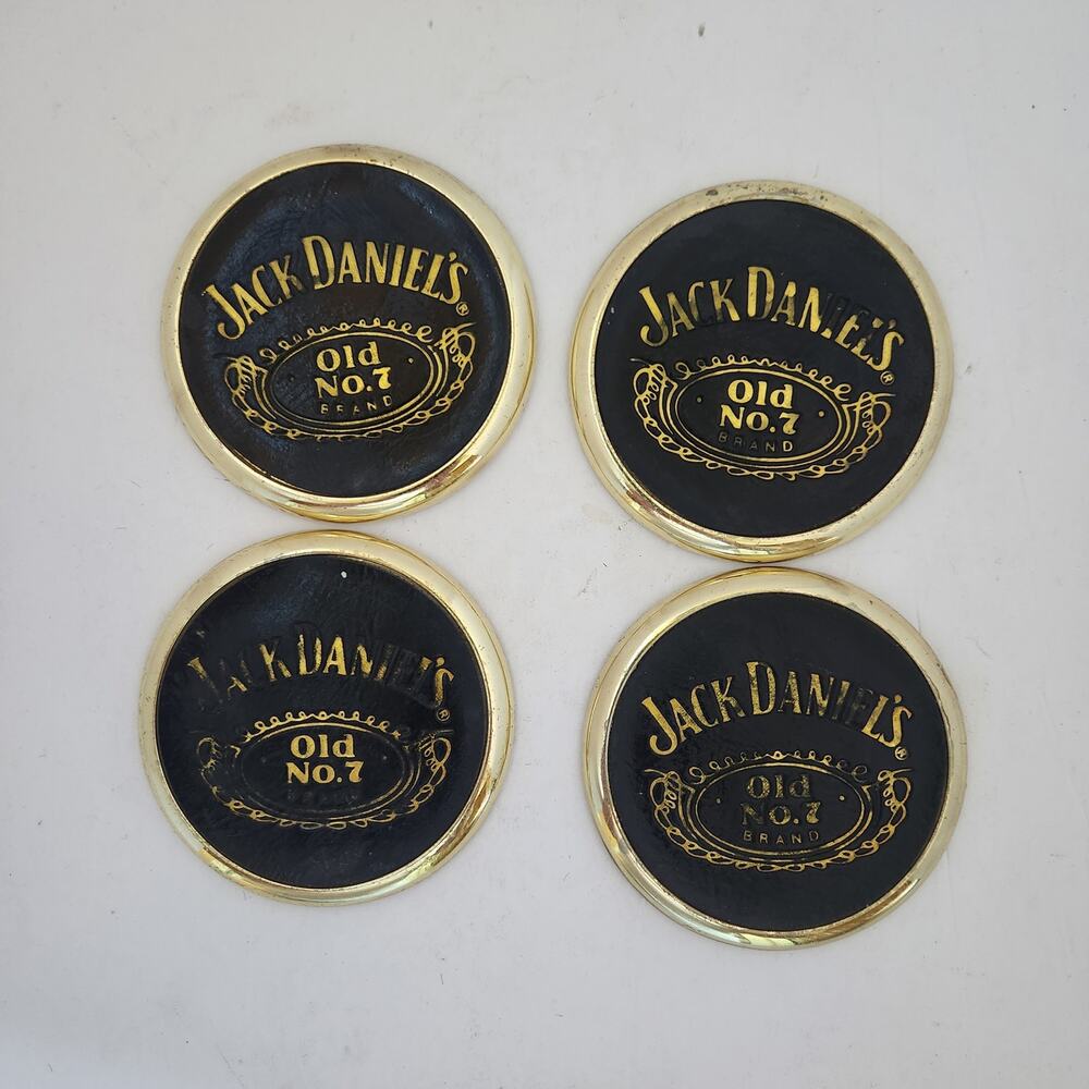 Vintage Jack Daniels coasters, leather and gold